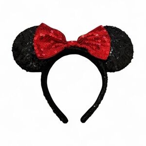 Disney Parks Minnie Mouse sequined ear headband with a red sequin bow